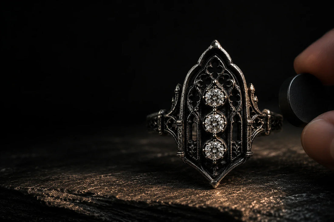 Testing an oxidized sterling silver Gothic ring with a neodymium magnet on dark slate