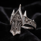 Spire Cross Ring close-up side angle, carved quatrefoil relief on the shoulders