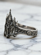 Sacred Gateway Cathedral Ring – close-up of hand-oxidized gothic tracery and pinnacle detail