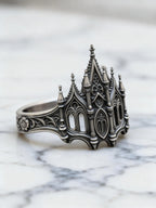 Sacred Gateway Cathedral Ring – angled view showing sky-piercing vertical silhouette