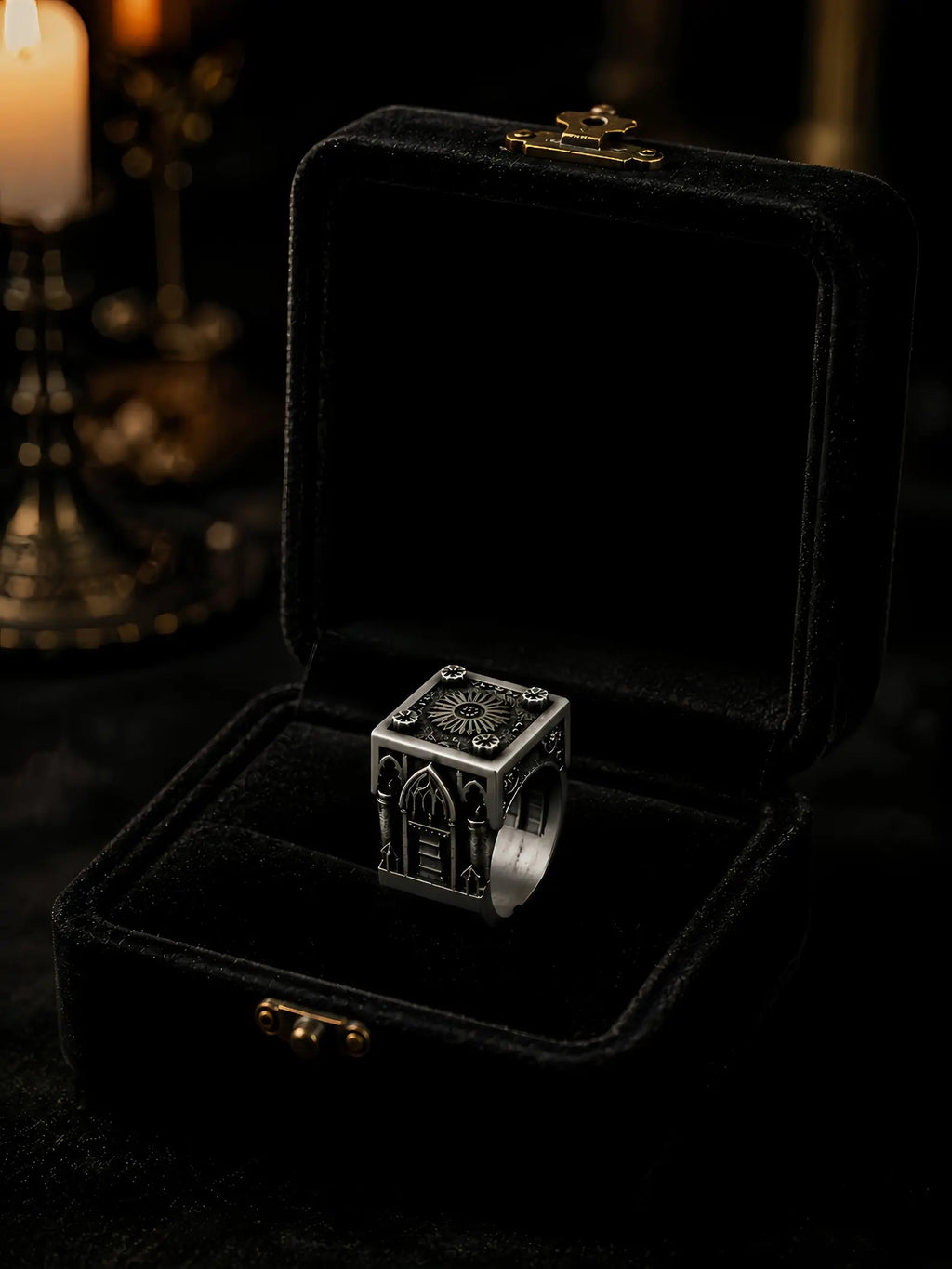 Gothic cathedral Lord's Signet ring presented in an open black velvet box by candlelight