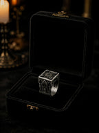 Gothic cathedral Lord's Signet ring presented in an open black velvet box by candlelight
