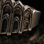Close-up of the Cathedral Arcade Ring's arch tracery detail