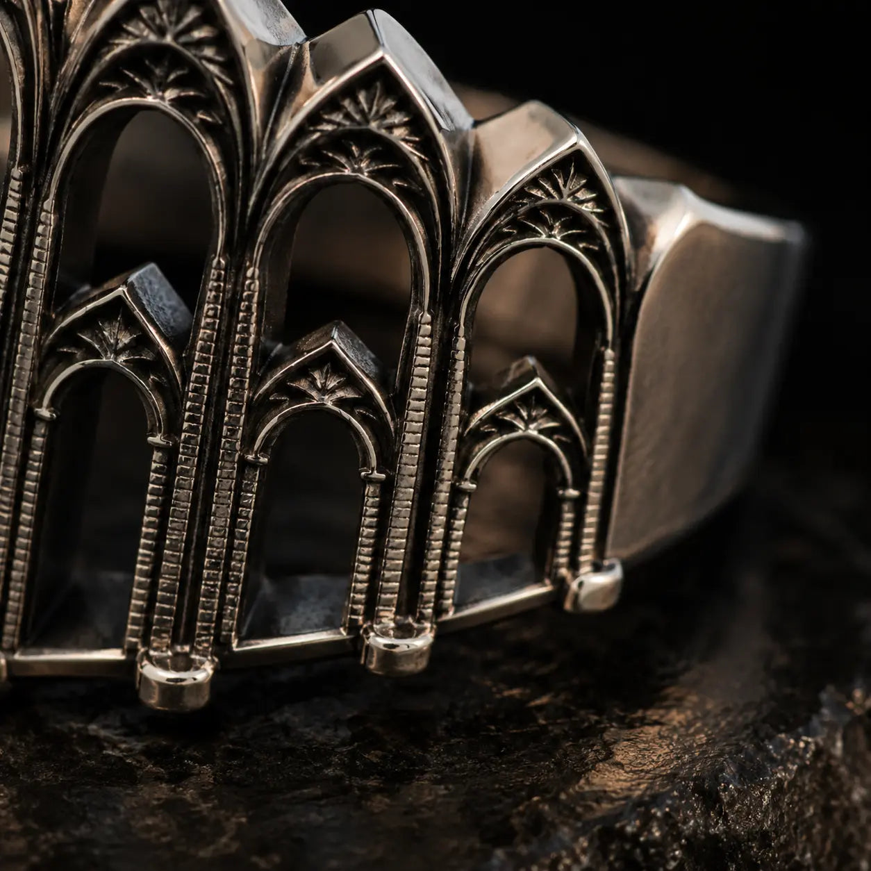 Close-up of the Cathedral Arcade Ring's arch tracery detail
