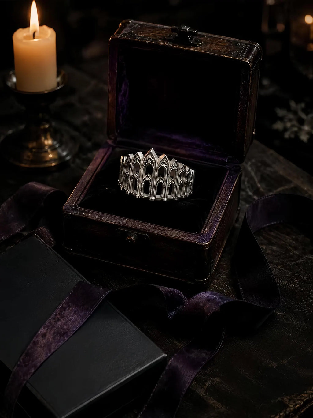 Cathedral Arcade Ring displayed in a jewelry box with ribbon and candlelight