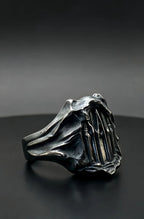 Dark Cathedral Ring side profile — raw textured oxidized sterling silver band