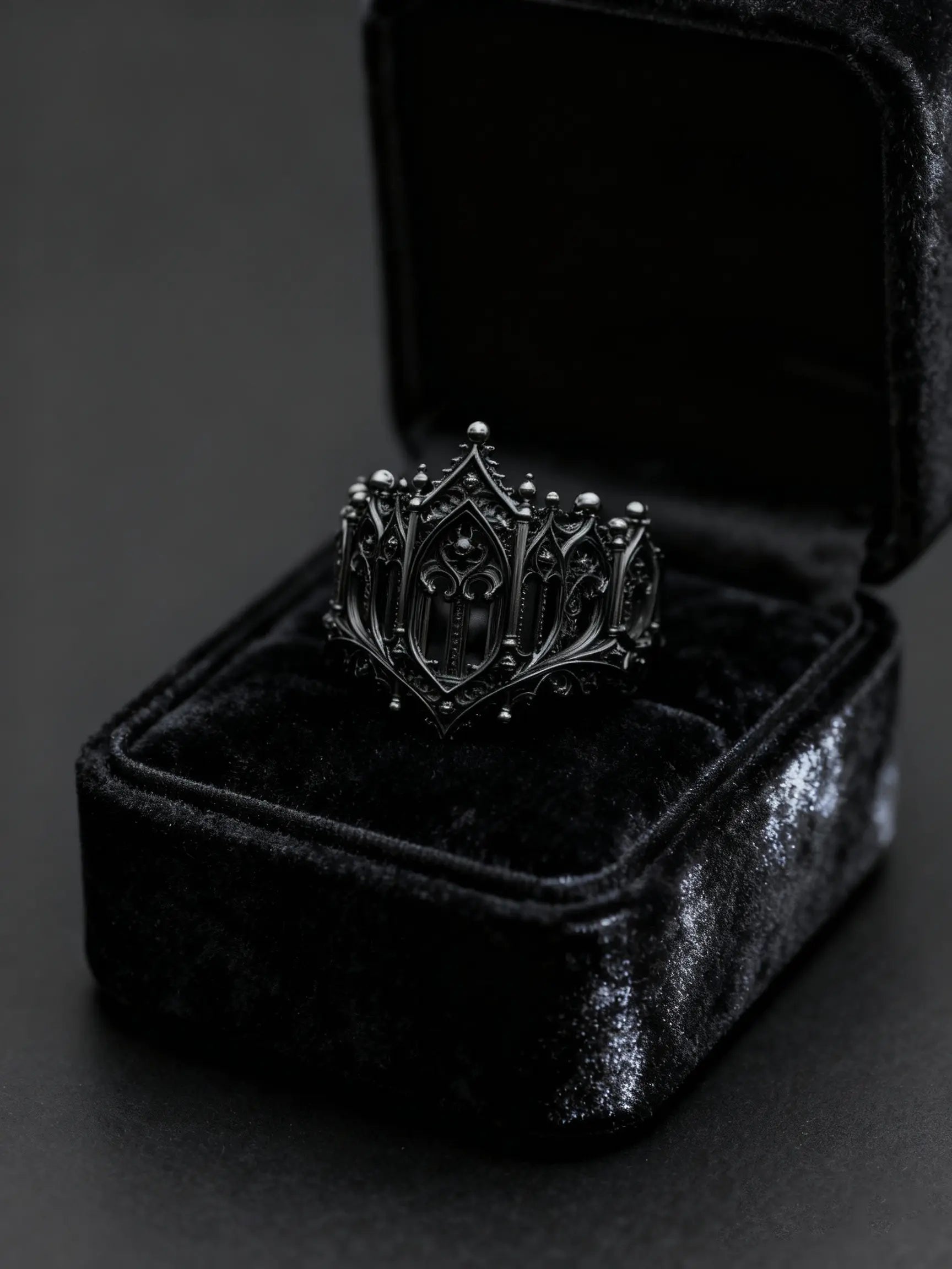 Rampart Crown Ring displayed in a black velvet ring box