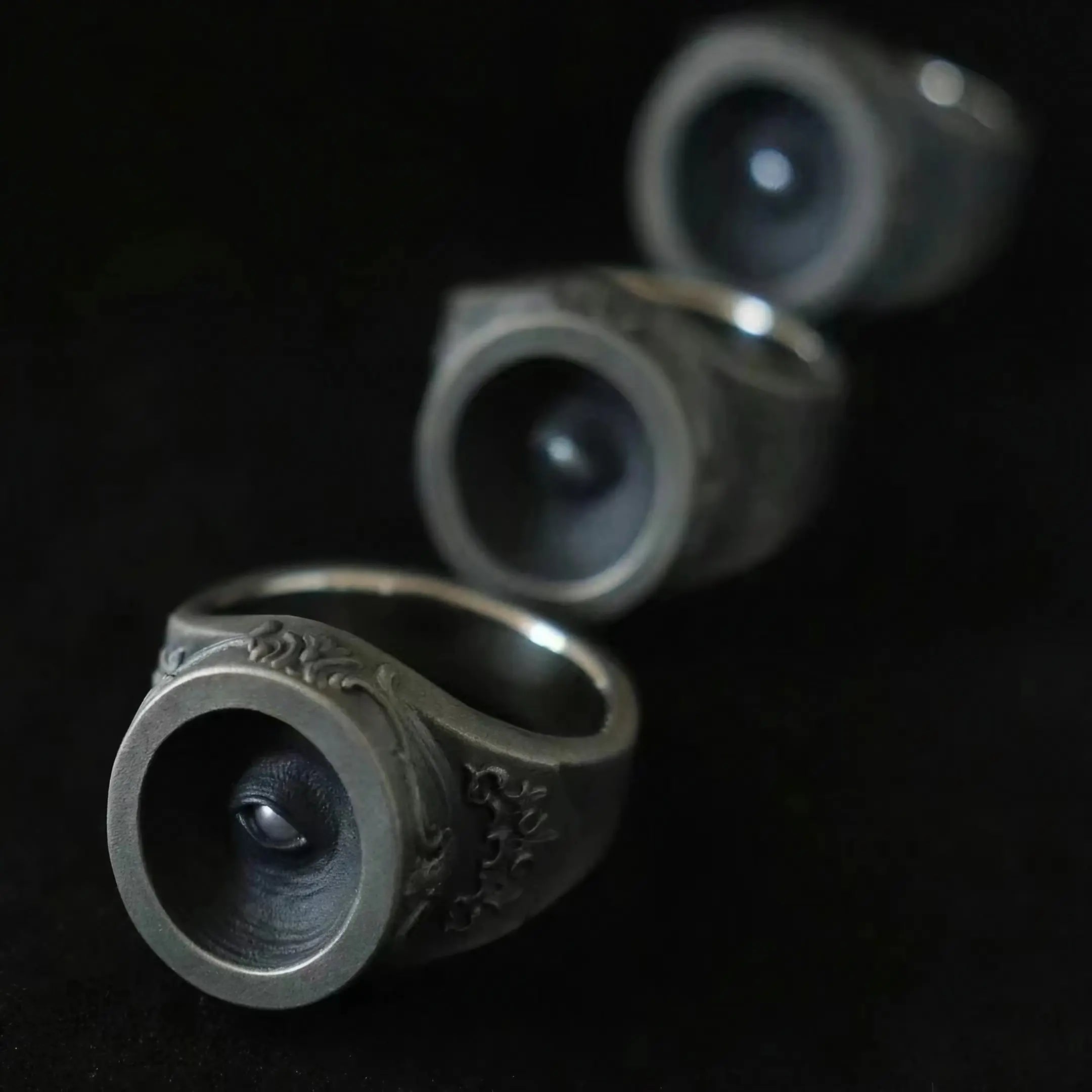 Cyclops eye ring detail, oxidized sterling silver with baroque relief shoulders