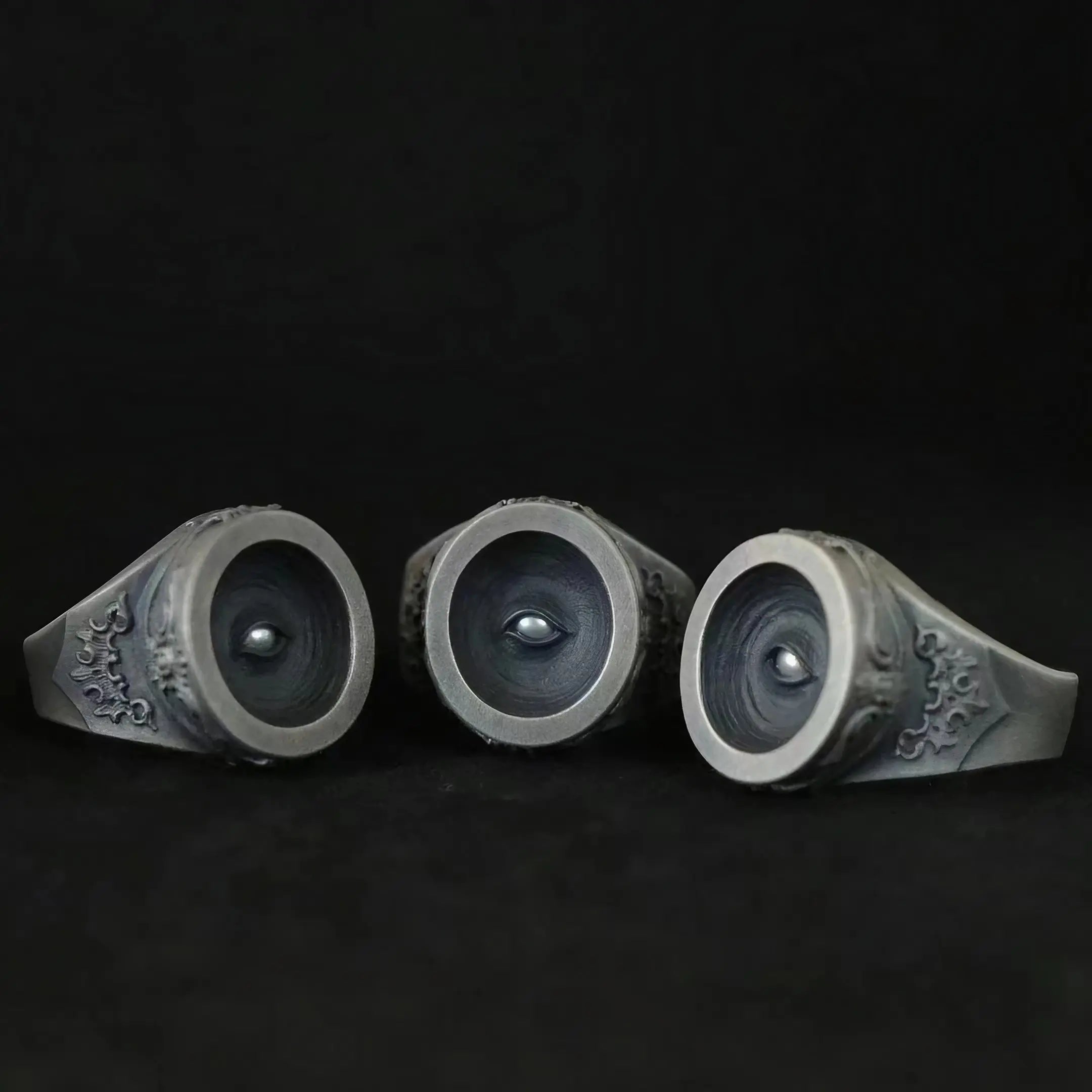 Cyclops all-seeing eye signet ring, hand-finished oxidized sterling silver, angled view