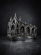 Cathedral spire crown ring close-up — micro-pinnacles and gothic lancet arches in sterling silver
