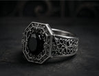 Cathedral Onyx Ring – close-up of fleur-de-lis sigils and acanthus filigree detail