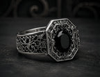 Cathedral Onyx Ring – angled view of hand-oxidized gothic relief and black onyx center