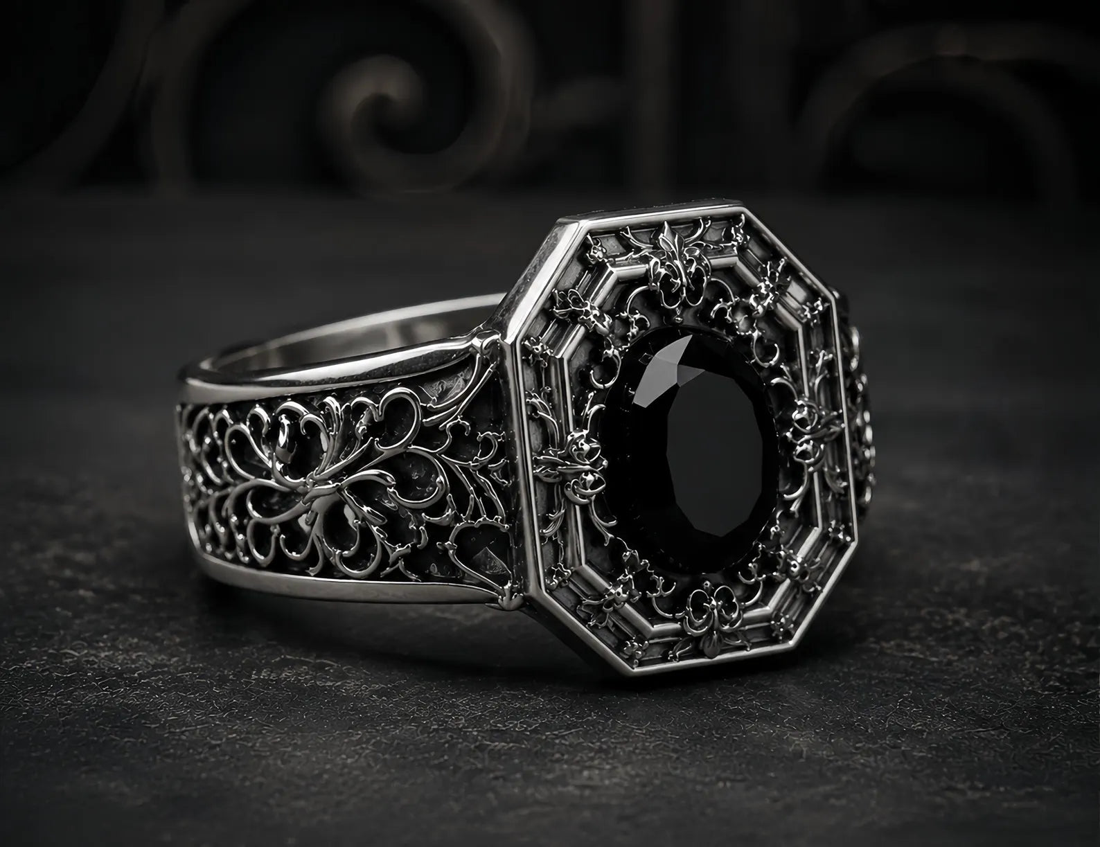 Cathedral Onyx Ring – angled view of hand-oxidized gothic relief and black onyx center