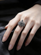 Side profile of the Elven Crown Ring showing tapered spires and moissanite