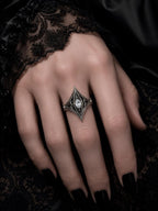 Elven Tear Ring worn on the hand, showing the filigree spire and marquise center stone