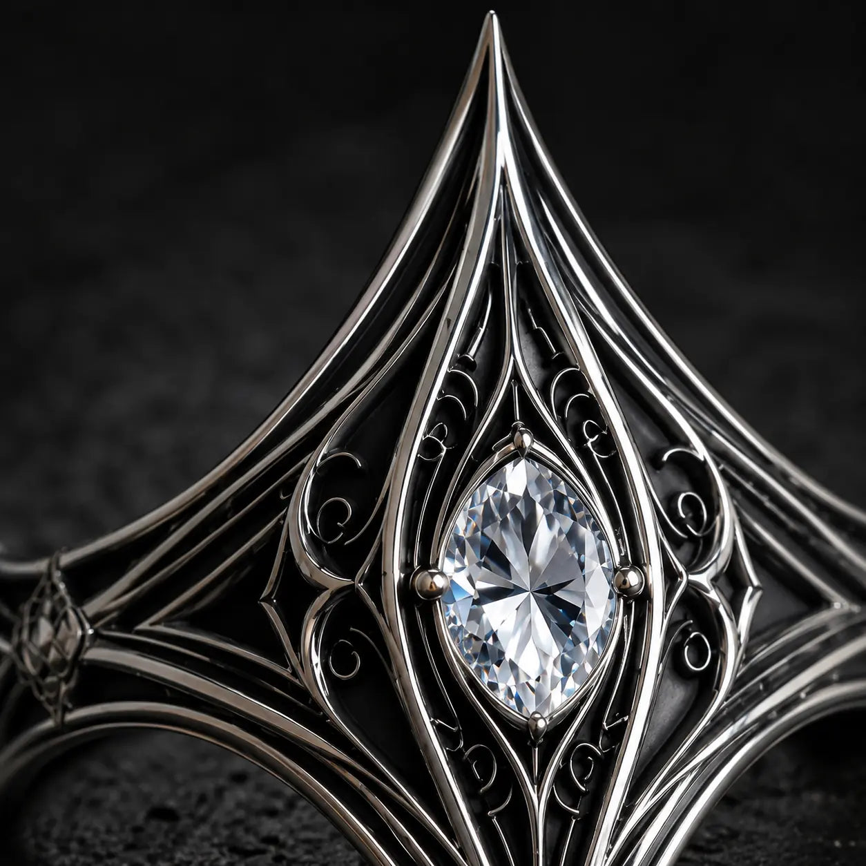 Macro close-up of the Elven Tear Ring's marquise moissanite and oxidized silver filigree