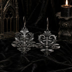 Iris and Spine dangle earrings side by side showing both gothic motifs