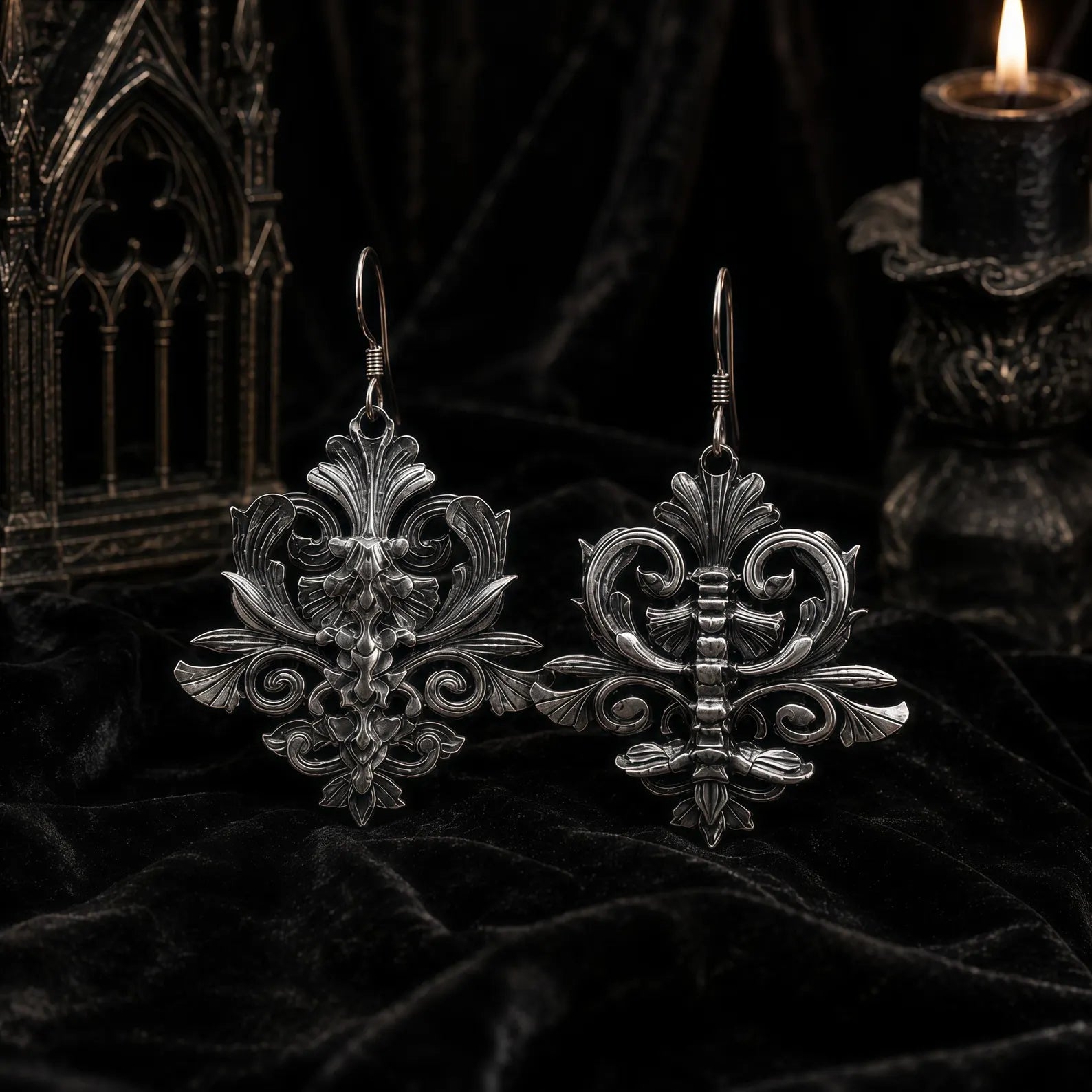 Iris and Spine dangle earrings side by side showing both gothic motifs