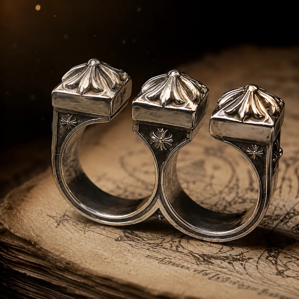 Double Fleur-de-Lis Ring top-down view showing the fused two-finger band structure