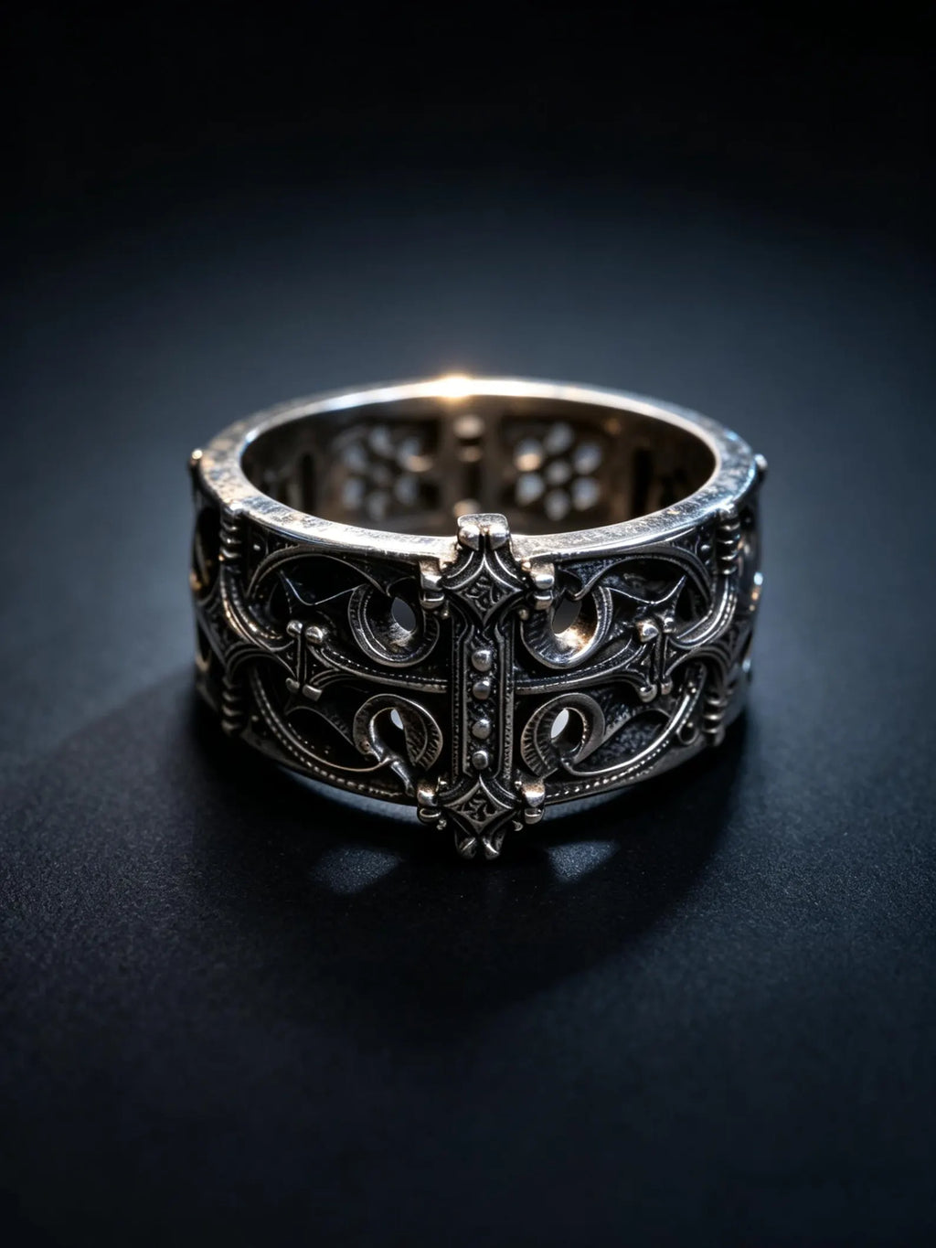 Sanctum Tracery Ring, wide pierced sterling silver band with raised cross, front view