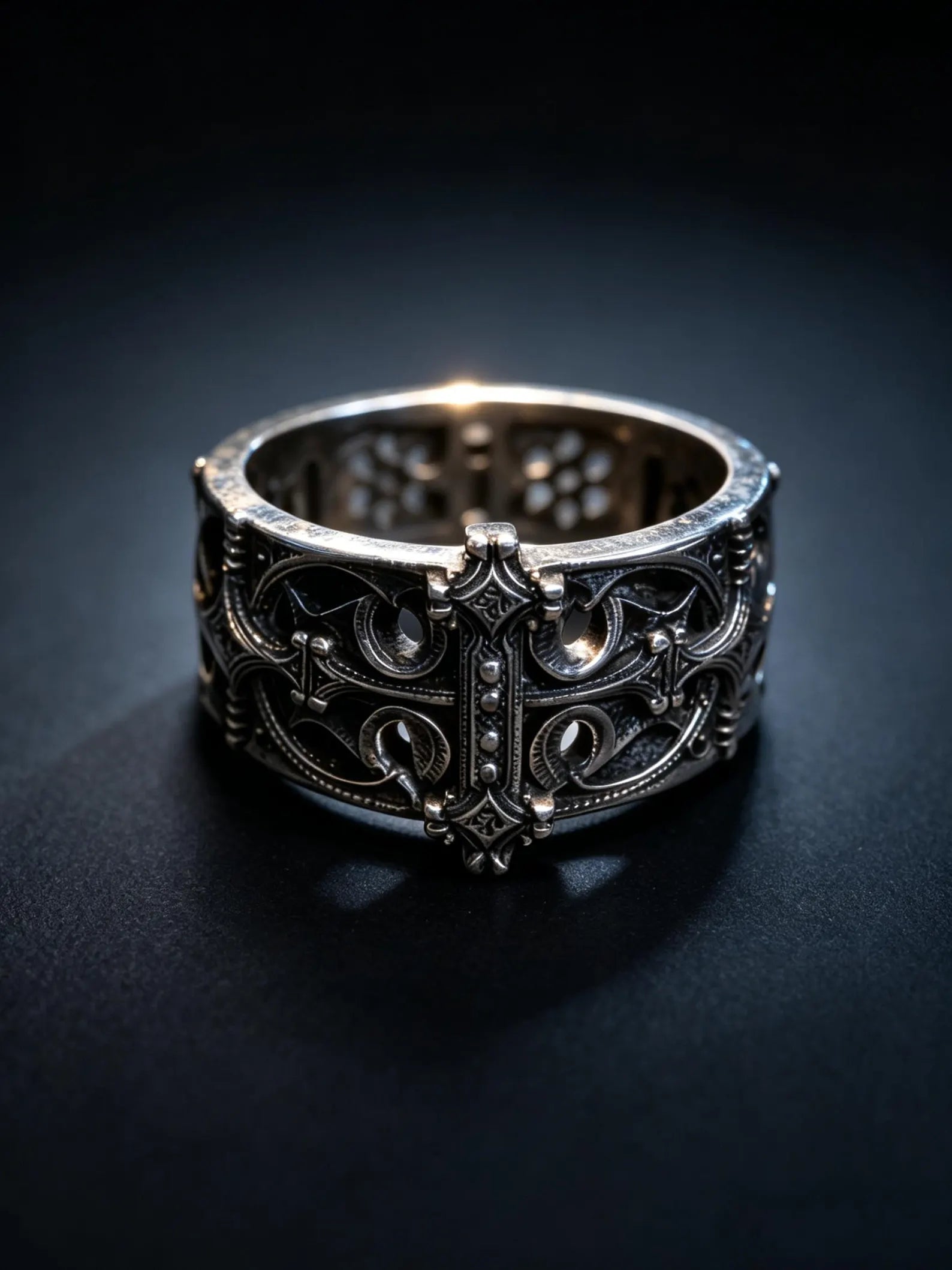 Sanctum Tracery Ring, wide pierced sterling silver band with raised cross, front view
