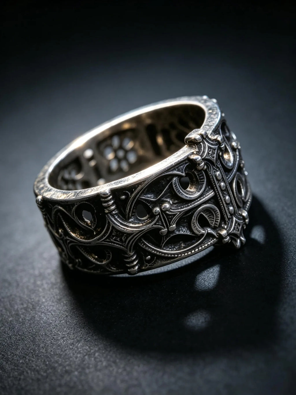 Sanctum Tracery Ring angled view showing deep pierced Gothic tracery