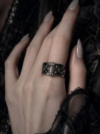 Sanctum Tracery Ring worn on hand with manicured nails, chunky Gothic band
