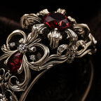 Baroque Cathedral Ring close-up of fleur-de-lis and vine scroll relief on the band