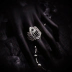 Burning Cathedral ring detail of the pierced Gothic tracery and cut rose window in oxidized silver