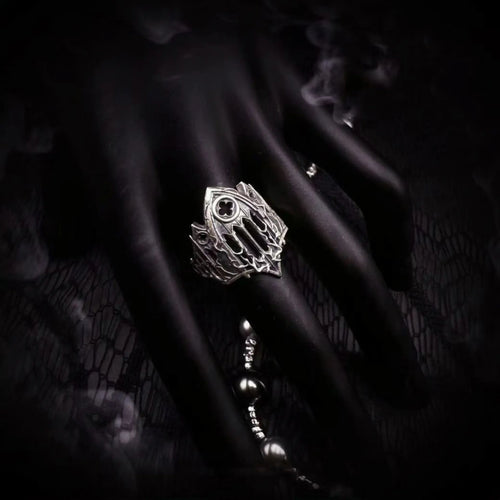 Burning Cathedral ring detail of the pierced Gothic tracery and cut rose window in oxidized silver