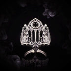 Front view of the Burning Cathedral Ring — pointed arch, cut rose window and pierced lancet tracery in oxidized silver