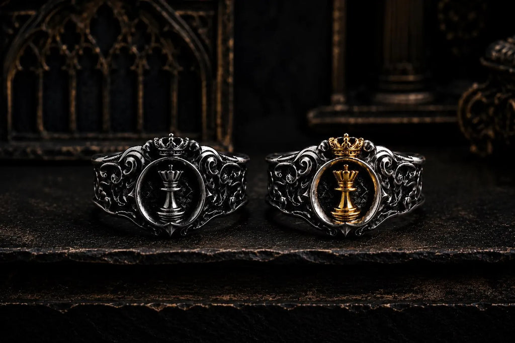 Angled view of the Chess Queen signet ring showing the gold queen, crown and carved sterling silver band