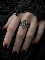 Sanctuary Window Ring worn on hand with black lace, Gothic gemstone ring
