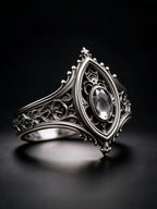 Sanctuary Window Ring front view, faceted center stone framed by tracery