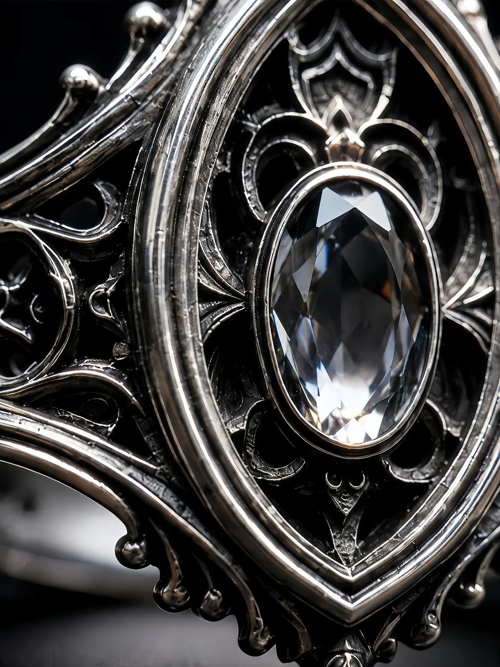 Sanctuary Window Ring close-up, oval-cut stone and carved fleur-de-lis detail