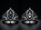 Sanctuary Window Ring in both finishes side by side, London Blue Topaz and Moissanite oval centers