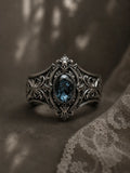 Victorian 925 sterling silver memento mori skull ring with London blue topaz — micro skull reliefs front view